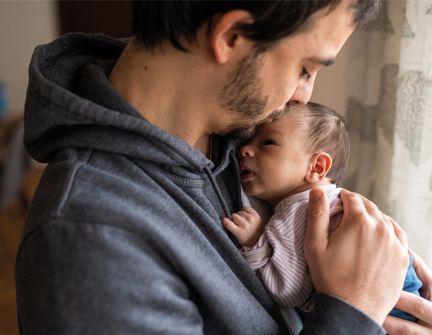 Dad cuddle_baby_s.jpg