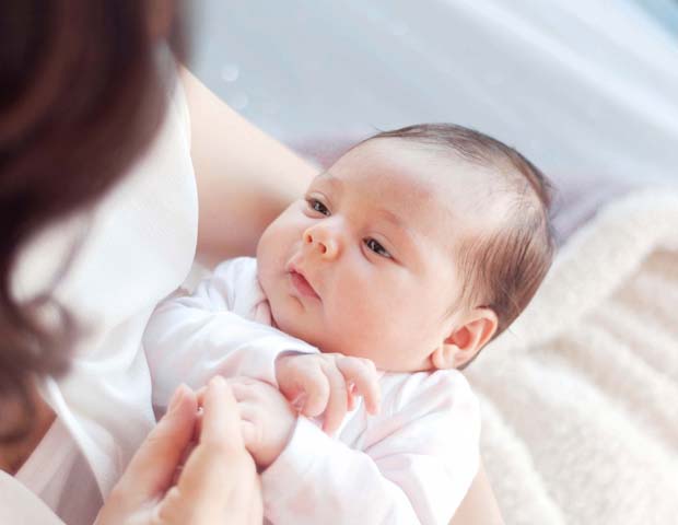 mother_looking_at_baby_sum.jpg